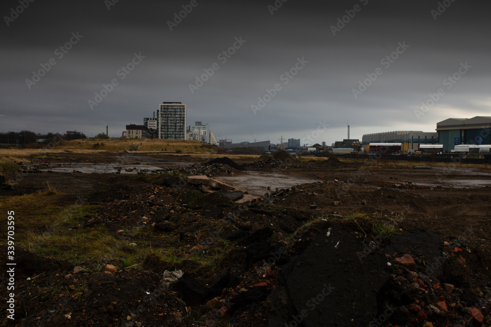 Wasteland in the post-industrial landscape of the river Clyde in the west of Scotland on a winters morning.