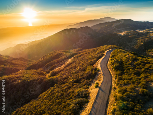 Aerial view of East Camino Cielo Road along the top of the Santa Ynez Mountains  at sunset , Santa Barbara, California