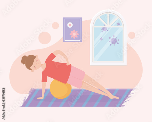 quarantine stay at home, woman training with fitball in room