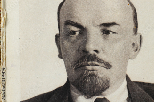 April 12, 2020, Moscow, Russia, an old photograph of Vladimir Ilyich Lenin in a book of the 30s