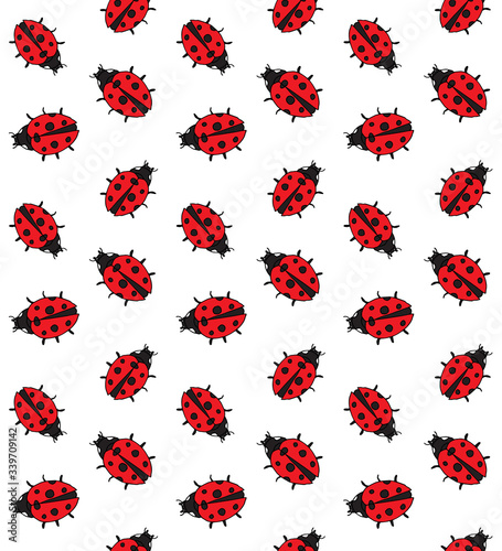 Vector seamless pattern of colored hand drawn doodle sketch ladybug isolated on white background