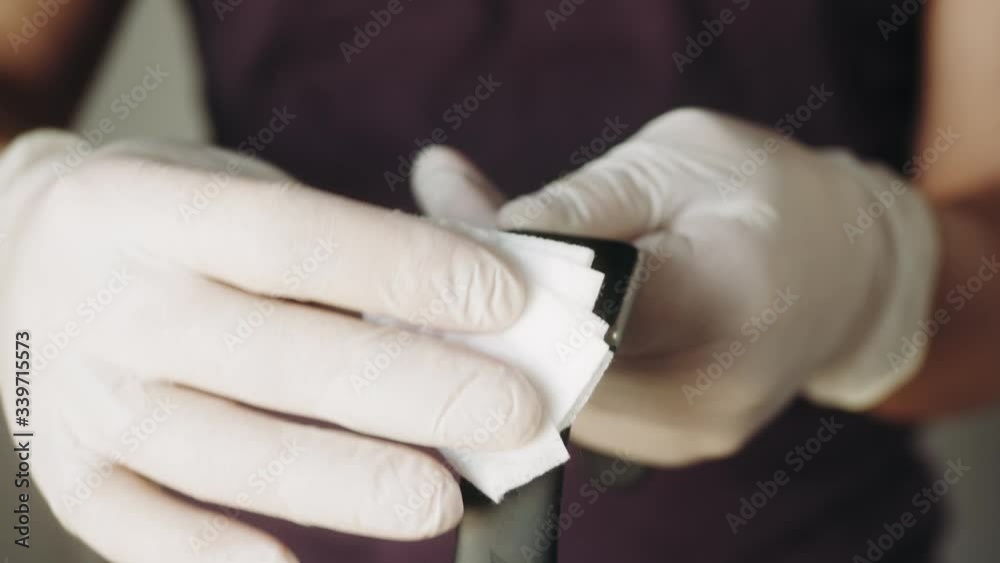 man hands disinfecting smart watch, eliminating germs coronavirus bacteria man hands disinfecting smart watch, eliminating germs coronavirus bacteria