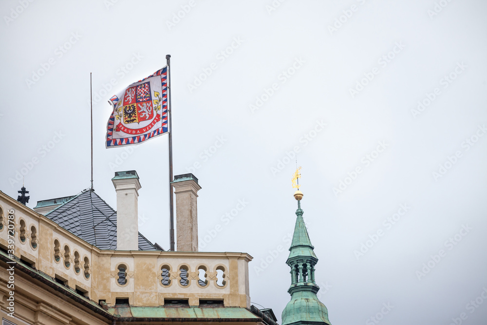 Official flag standard of the president of Czech Republic floating above  Prague Castle (Prazsky Hrad) with its slogan in Czech, Pravda Vitezi,  meaning justice prevails Stock Photo | Adobe Stock