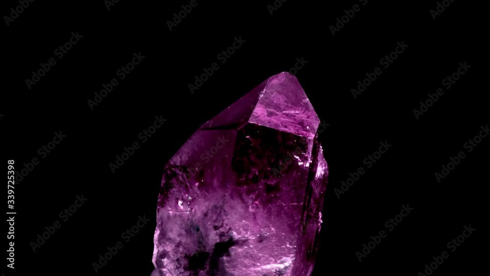 Amazing colorful Quartz Purple crystal cluster isolated on black background, Angel aura mineral. Macro of beautiful raw mineral stone Amazing colorful Quartz Purple crystal cluster isolated on black background, Angel aura mineral. Macro of beautiful raw mineral stone