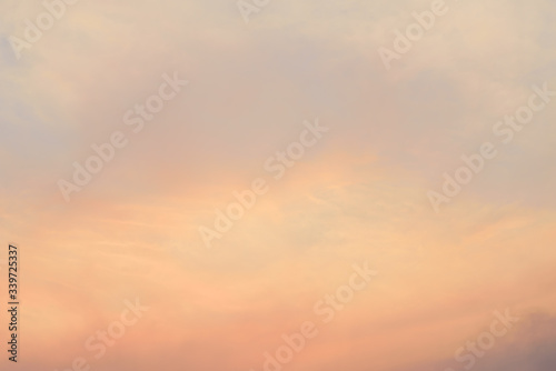 Beautiful vanilla sky with clouds after sunset in the evening © nungning20