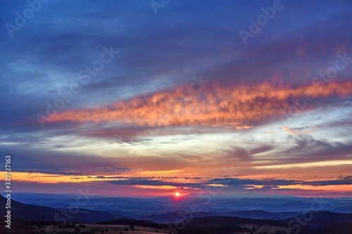 Sunset seen from Szczeliniec Wielki peak in Table Mountains, Poland