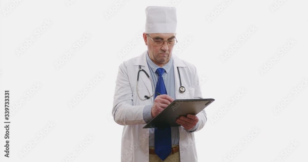 Doctor standing uses tablet computer, close up, 6k. Isolated on white. Doctor standing uses tablet computer, close up, 6k. Isolated on white.