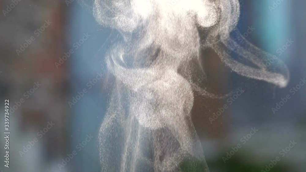 Water steam particles background super slow motion.
Steam in a mesmerizing super slow motion. 
Suspended steam water particles.
