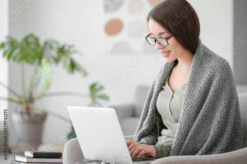 Beautiful young woman worki...