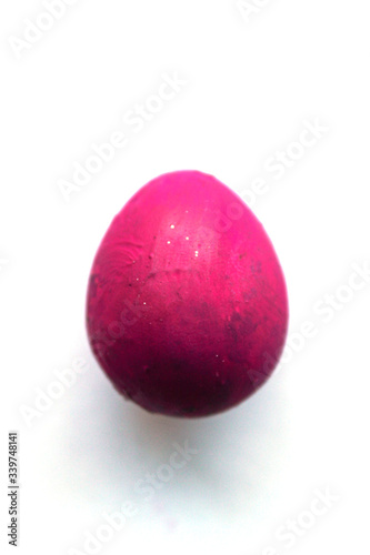 Purple easter egg isolated on white background