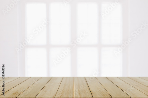 Empty wooden table and window room interior decoration background, product montage display,can be used for display or montage your products.Mock up for display of product.