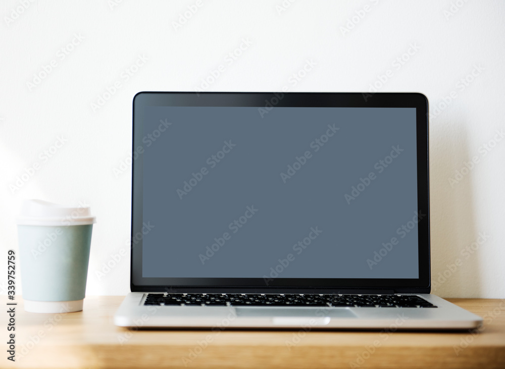 Fototapeta premium Mockup computer laptop on wooden table