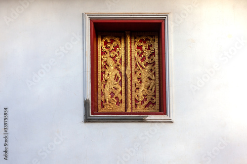 Isolated vintage windows on white wall at Luangpabang Laos