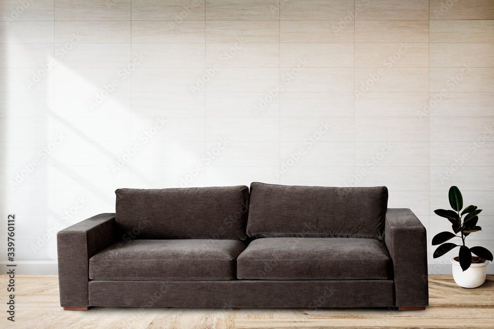 Fototapeta premium Sofa by a tiled wall