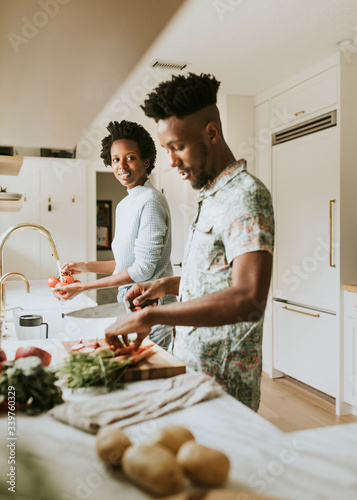 Black couple cooking
