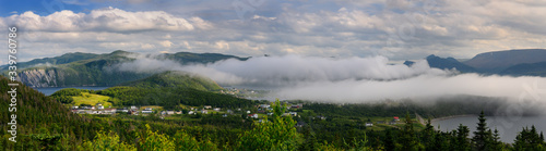 Panorama of low misty cloud a over Bonne Bay at Norris Point Newfoundland in the evening