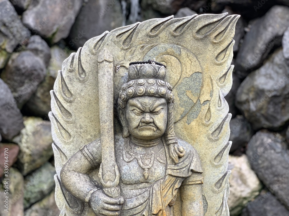 Japanese carving of the bodhisattva Jizo, protector of travelers and children