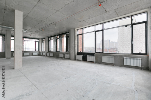 empty pure commercial office building undecorated in gray colors.open space office