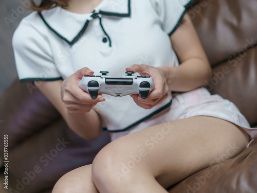 Crop of woman playing console games, Woman enjoying in video games.