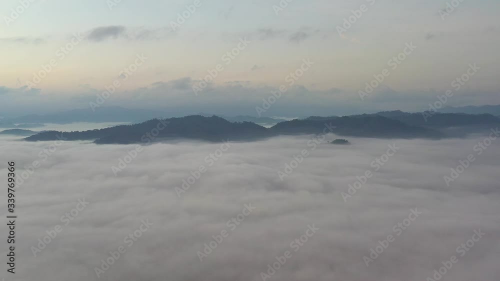 Aerial video of beautiful nature in the morning. Morning time have many clouds over the mountain in Ranong province, Thailand. Aerial video of beautiful nature in the morning. Morning time have many clouds over the mountain in Ranong province, Thailand.