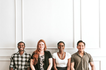 Diverse people sitting in a row