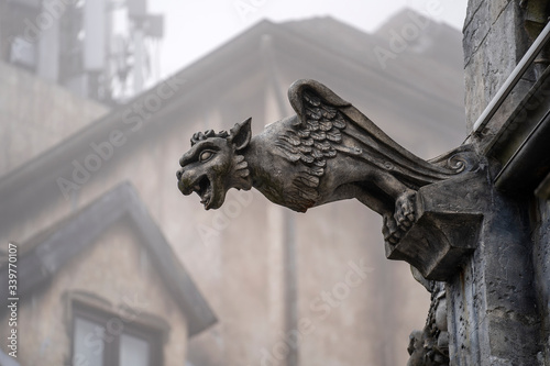 Gargoyle statue, chimeras, in the form of a medieval winged monster, from the royal castle in Bana hill, tourism site in Da Nang, Vietnam, close up photo