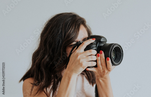 Female photographer at a shoot photo