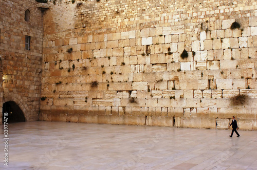 One Jewish orthodox man at Kotel Wailing Western Wall in Jerusalem Old City Israel photo