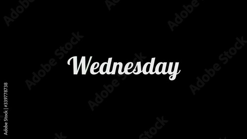 Wednesday 4k concept color electric text graphic effect animation over black backgrond for your proyect. photo