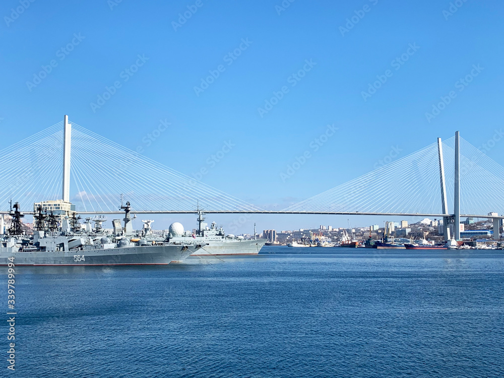 Vladivostok. Golden bridge-cable-stayed bridge over the Golden horn Bay in spring in sunny weather