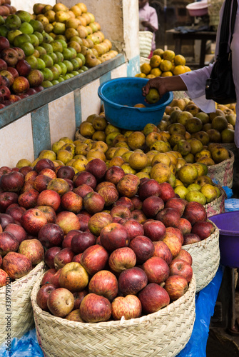 фотографія Etal de pommes en vente au marché de Fianarantsoa - Madagascar.