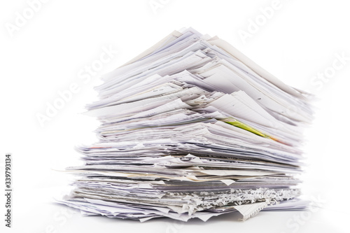 Large pile of waste paper isolated on white