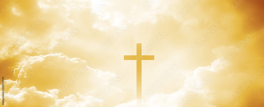 The Christian cross looks bright in the golden sky, with soft white clouds and beautiful light which leads to peace and heaven. The Christian cross looks bright in the golden sky, with soft white clouds and beautiful light which leads to peace and heaven.