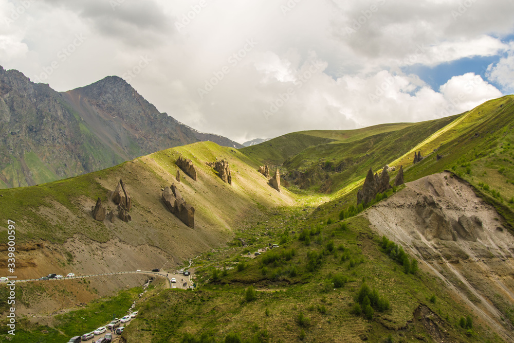 Naklejka premium mountain landscape with clouds