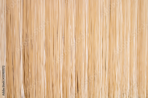 Noodles on a wooden frame