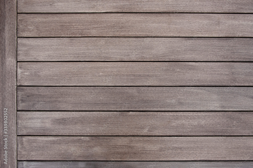 Dark brown wood texture with natural striped pattern background Dark brown wood texture with natural striped pattern background