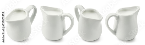 Set of ceramic milk jars or creamers isolated on white background. Package design element with clipping path