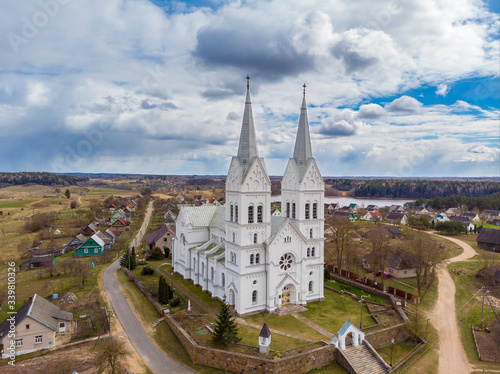 The aerial view of the old village Slobodka and the chatolic church. Braslaw district, Belarus photo