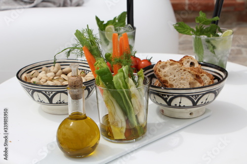 luxury restaurant with pinzimonio, oil, carots and vegetable photo