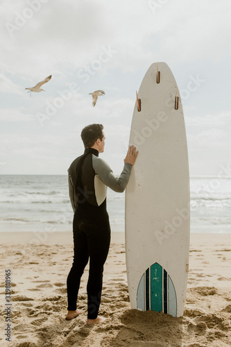 Professional surfer on the beach