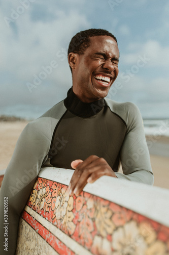 Smiling male surfer