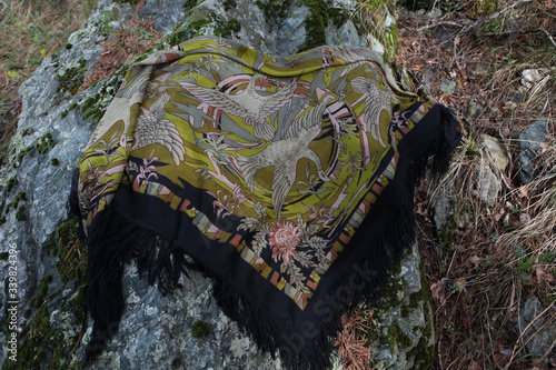 Vintage russian Pavlovo Posad shawl, scarf and spring nature of Altai Krai, Russia. Russian folk, retro style in fashion. Pavlovoposadsky, Pavloposadsky shawl, scarf photo