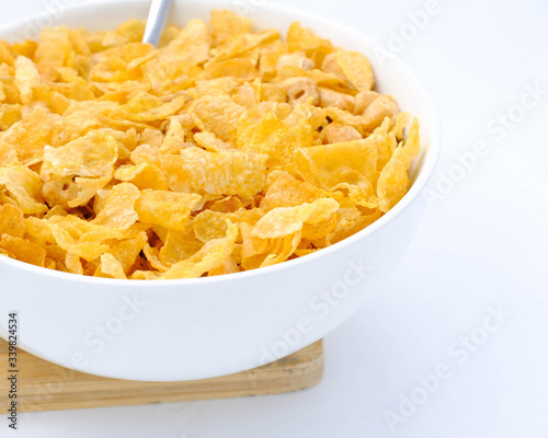 cereal in a white bowl on background. Healthy breakfast concept.