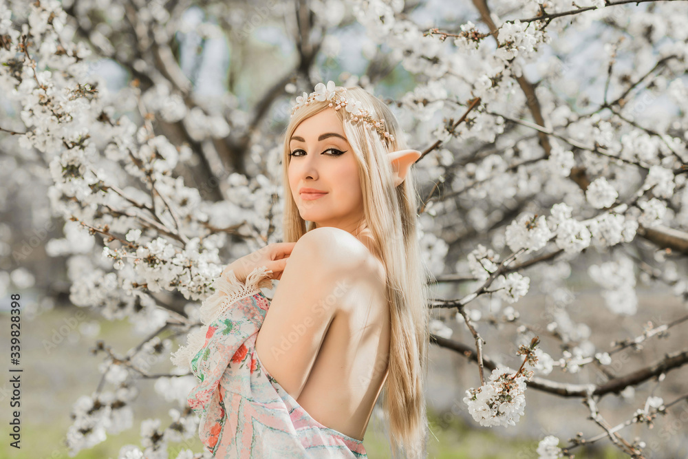 Elf woman in garden, cosplay, Halloween, ideas Elf woman in garden, cosplay, Halloween, ideas