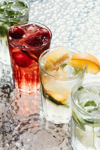Different types of lemonades with strawberries, citrus, mint. Menu cafe and restaurant. Cold summer drinks.