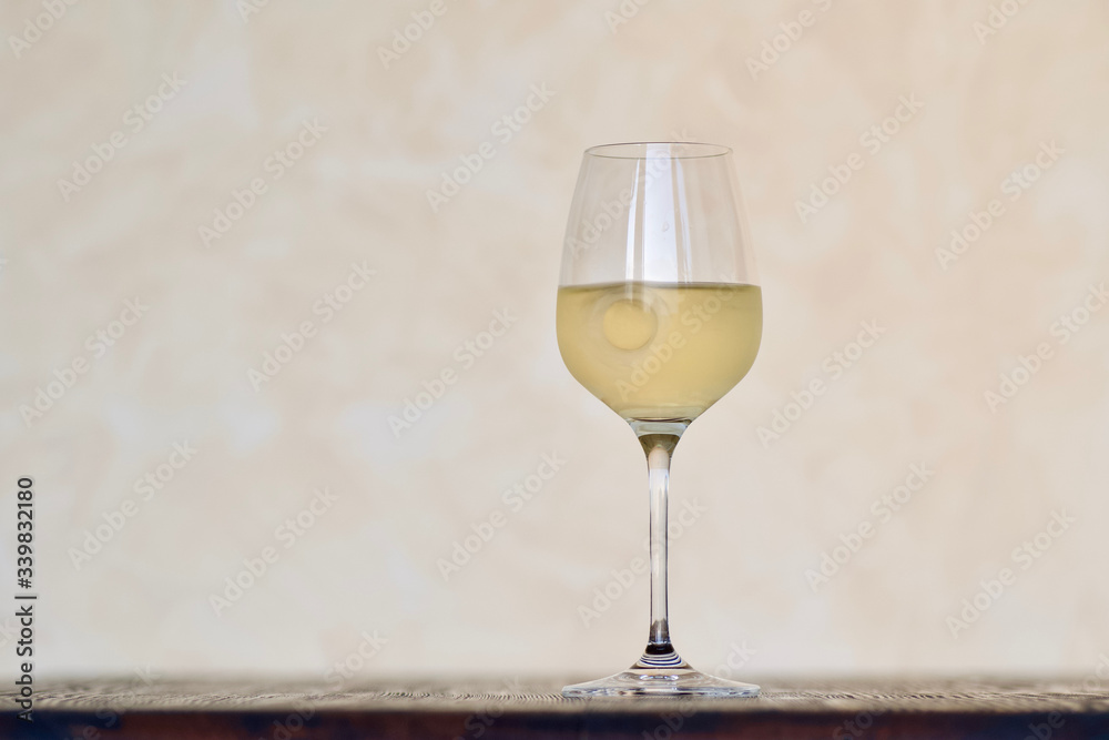 relax with a fresh delicious glass german riesling white wine on a table relax with a fresh delicious glass german riesling white wine on a table