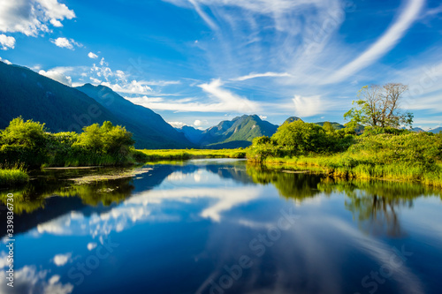 Passion of reflection along Pitt lake in British Columbia, Canada photo