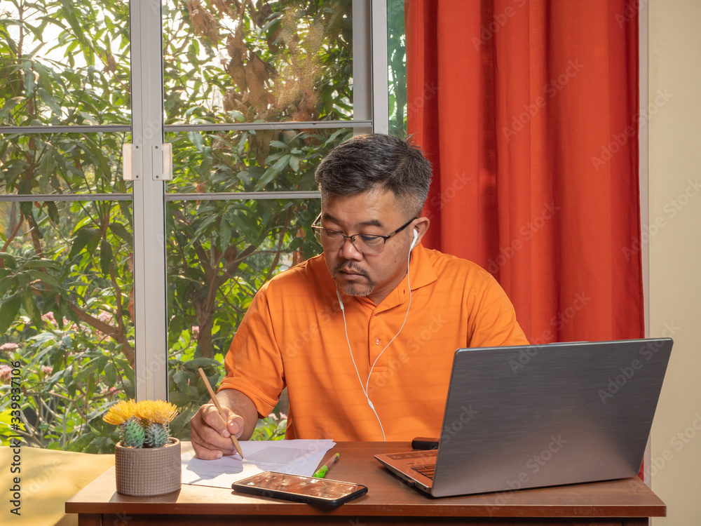 businessman working at home with computer laptop. businessman working at home with computer laptop.