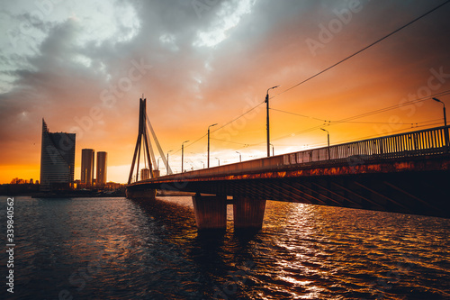 Vansu bridge in Riga cable-stayed bridge  crosses the Daugava river in susnet time © Aleksandrs Muiznieks