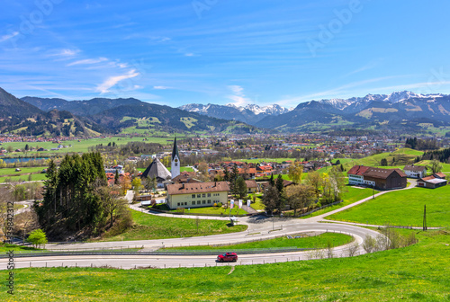 City of Sonthofen with mountains and meadows at a beautiful spring day. Allgäu Alps, Bavaria, Germany photo